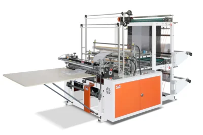 Industrial packaging machine with conveyor system and adjustable components.
