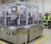 Refiladora machine with safety features and operators in PPE