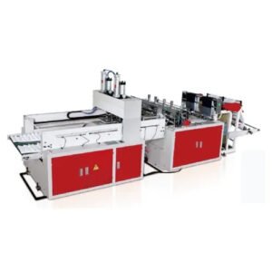 Industrial machine with multiple sections and red accents, used for manufacturing processes